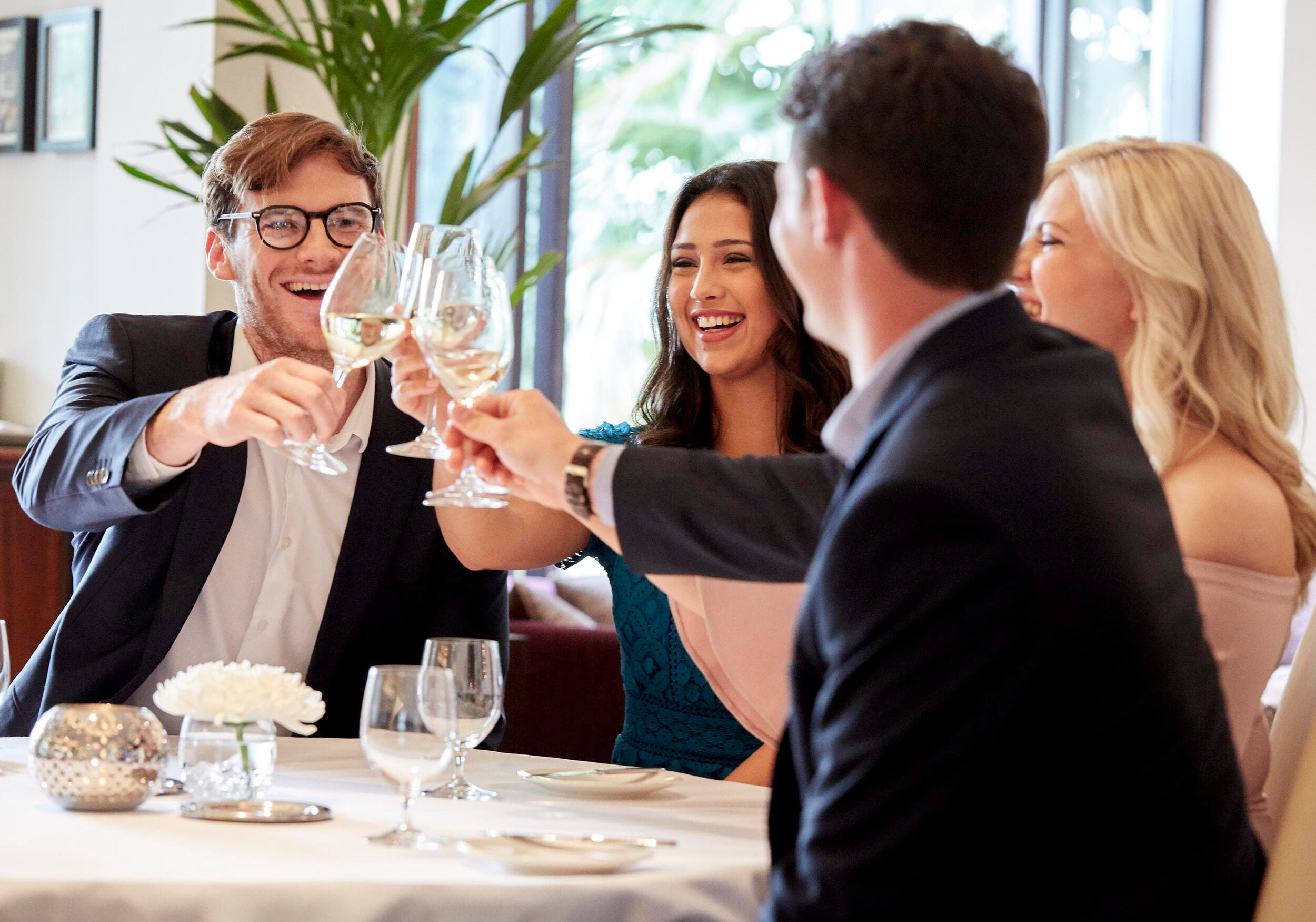 Friends enjoying drinks in restaurant